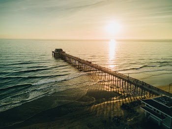 photography of beach with house