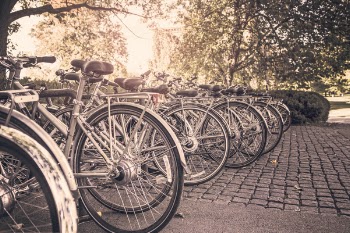 Photography of Bicycles Parked on Stone Floor