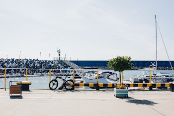 Photography of Black Hardtail Mountain Bike Beside Body of Water