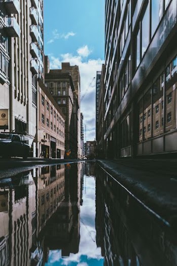 photography of body of water on street