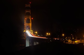 Photography of Bridge at Night