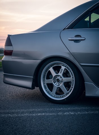 Photography of Car On Asphalt Road