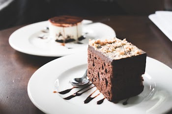 Photography of Chocolate Brownies on White Saucer