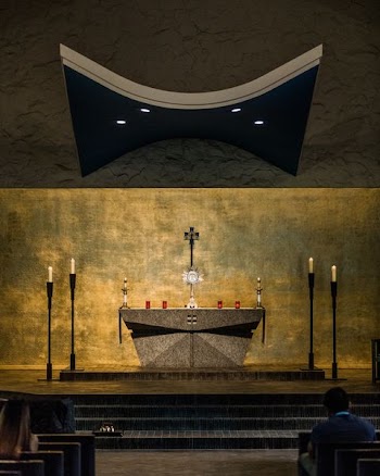 photography of church isle through altar