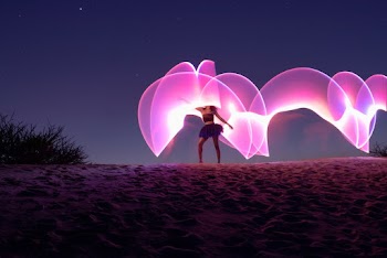 Photography of Dancing Woman during Nighttime