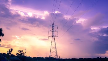 Photography of Electric Tower during Sunset