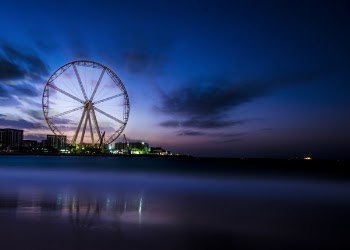 Photography Of Ferris Wheel Near Body Of Water