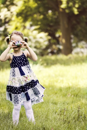 Photography of Girl Taking Picture