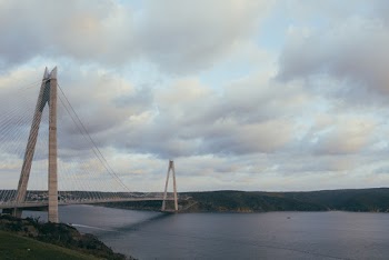 Photography of Gray Suspension Bridge