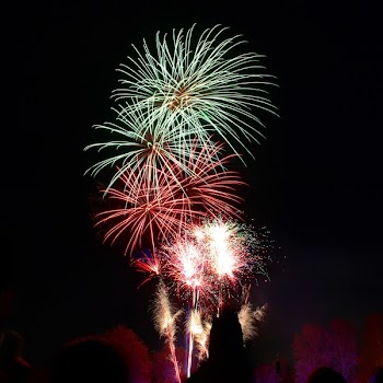 Photography of Green and Red Fire Works Display