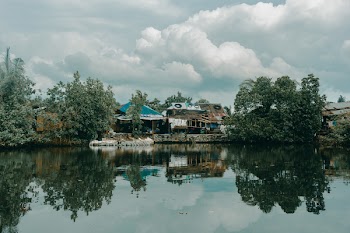 Photography of Houses Near Body of Water