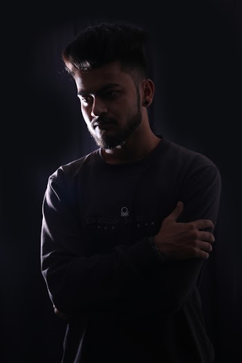 Photography of Man in Black Sweatshirt