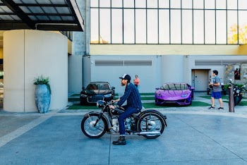 Photography of Man Riding Motorcycle