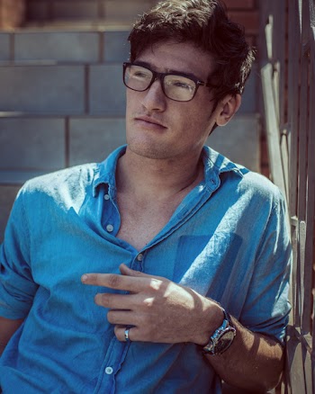 Photography of Man Wearing Eyeglasses