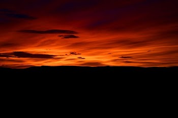 photography of orange clouds at golden hour