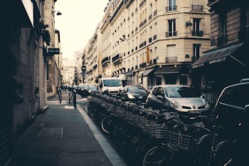 Photography of Parked Bicycles Near Buildings