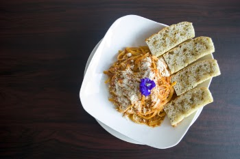 Photography of Pasta with Garlic Bread