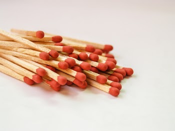Photography of Piled Red Matchsticks
