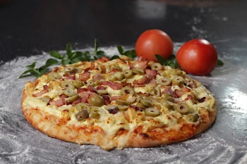 Photography of Pizza With Olive Toppings