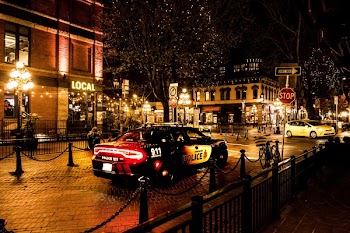 Photography of Police Car During Night Time