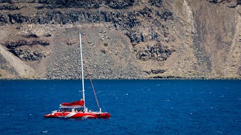 Photography of Red Sailing Boat on Sea