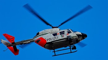 Photography of Red White and Blue Helicopter