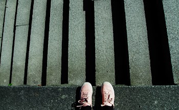 Photography of Shoes Near Stairs