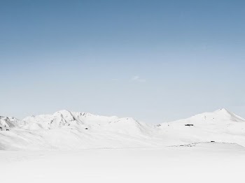 photography of snow covered mountain at daytime