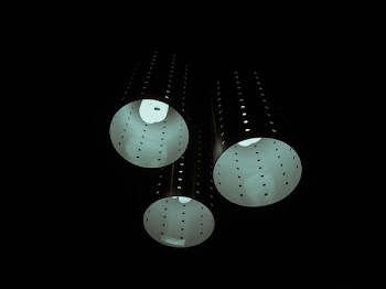 Photography of Three Lamps on Dark Room