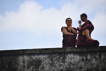 Photography of Three People Talking to Each Other