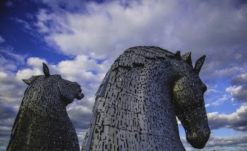 Photography of Two Silver Horse Statue