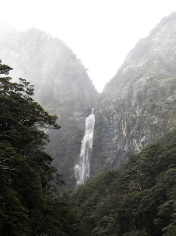 Photography of Waterfalls Between Mountain