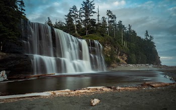 Photography Of Waterfalls Near Mountain