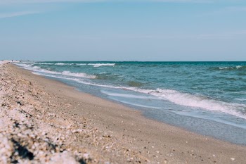 photography of waving body of water