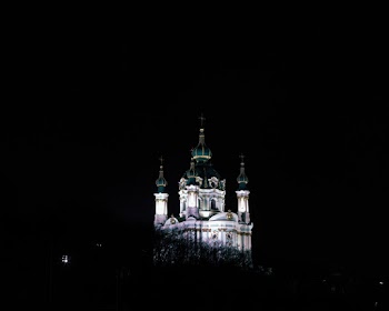Photography of White and Green Concrete Church during Nighttime