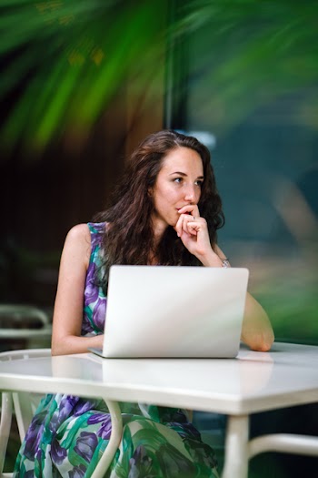 Photography of Woman Using Laptop