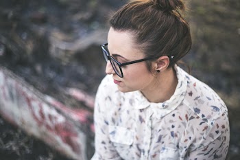 Photography of Woman Wearing Eyeglasses
