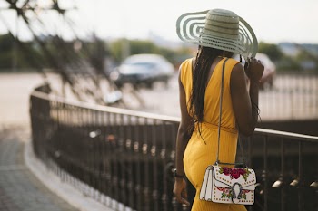 Photography of Woman Wearing Yellow Jumpsuit