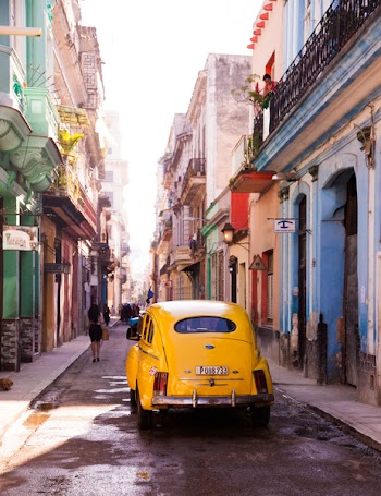 Photography of Yellow Car on Alley