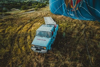 pickup truck beside textile