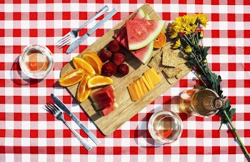 Picnic Snacks Wine And Flowers