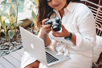 Picture Of a Woman Holding a Camera