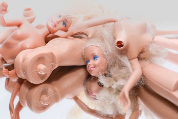 Pile of Barbie Dolls