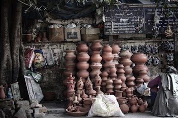 pile of brown clay pots