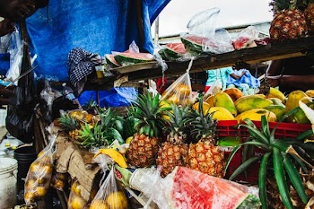 Pile Of Fruits On Wooden Shelf