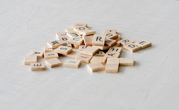 Pile of Scrabble Pieces