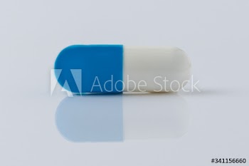 Pill for viral disease on a white background