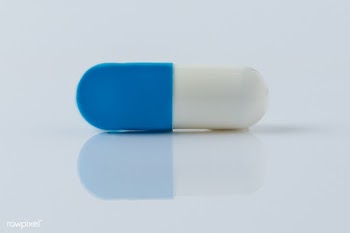 Pill for viral disease on a white background | Free  photo - 2299331