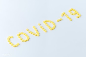Pills for COVID-19 on a white background | Free  photo - 2297441