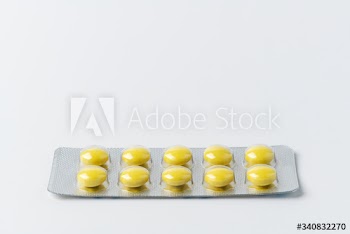 Pills for viral disease on a white background
